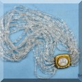 J11. Beaded necklace with 18K gold and intaglio clasp. 